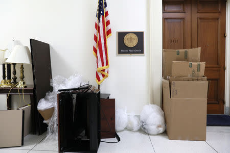 Furniture to be moved sits in the hall outside of U.S. Congressional offices weeks before the end of the current term, as dozens of outgoing and incoming members of Congress move into and out of Washington as votes on a potential federal government shutdown loom, on Capitol Hill in Washington, U.S., December 17, 2018. REUTERS/Jonathan Ernst