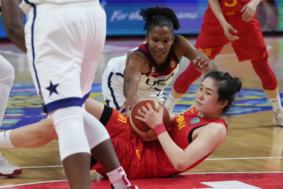 United States' Alyssa Thomas looks to take the ball from China's Pan Zhenqi during their game at the women's Basketball World Cup in Sydney, Australia, Saturday, Sept. 24, 2022. (AP Photo/Mark Baker)