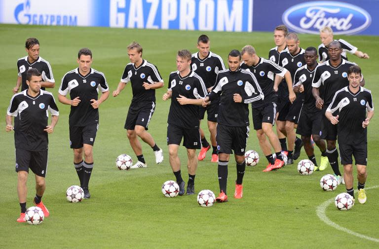 FC Copenhagen players practice during a training session at the Santiago Bernabeu stadium in Madrid on October 1, 2013