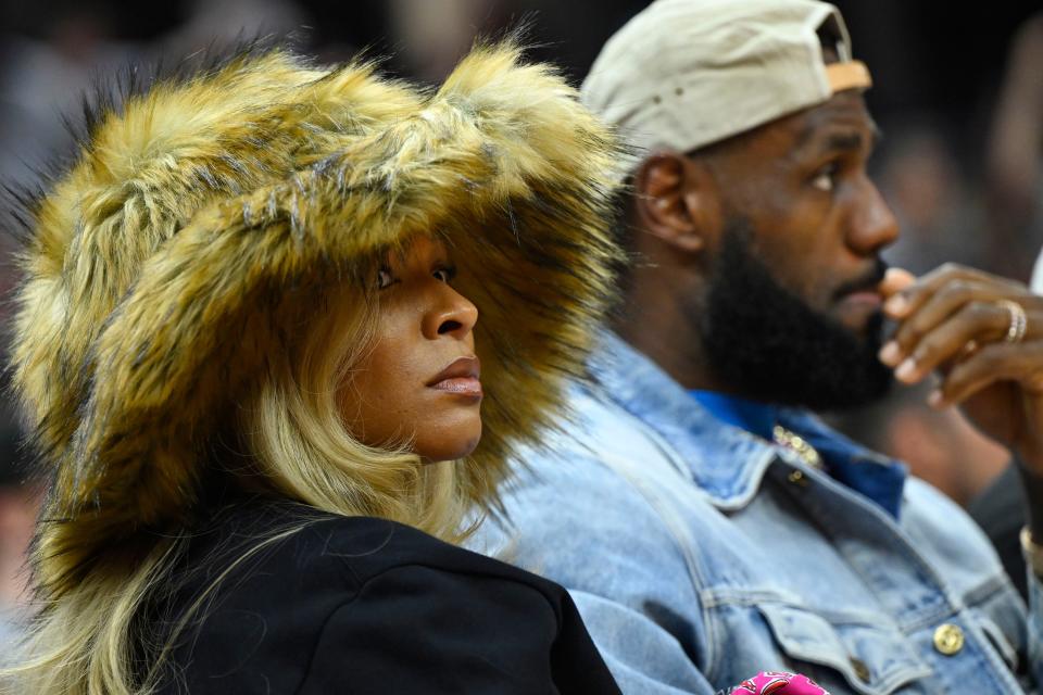 Lakers forward LeBron James and his wife Savannah James watch the Cavs and Celtics in the second quarter of Game 4 of the Eastern Conference semifinals, May 13, 2024, in Cleveland.