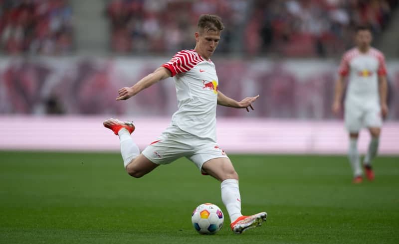 Leipzig's Dani Olmo in action during the German Bundesliga soccer match between RB Leipzig and FSV Mainz 05 at Red Bull Arena. Hendrik Schmidt/dpa