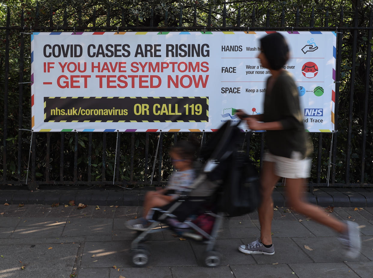 A public information sign warning of rising Covid-19 cases in London after Prime Minister Boris Johnson announced a range of new restrictions to combat the the coronavirus outbreak in England. (Photo by Yui Mok/PA Images via Getty Images)