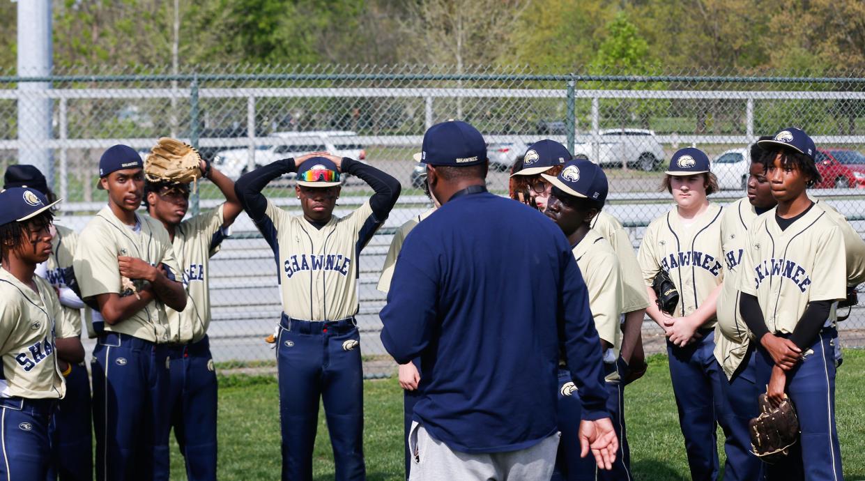 Shawnee coach Timothy Ladd Sr. talks to his team before its game against Francis Parker.