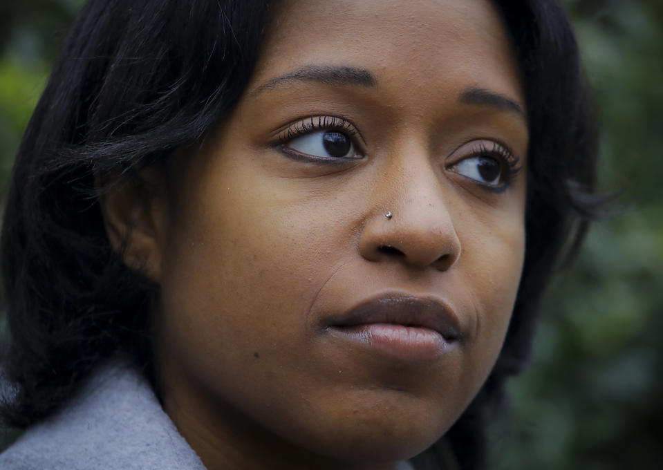 FILE - In this Dec. 14, 2018 file photo, Taylor Dumpson, who was the first black woman to serve as student government president at American University and who has been the target of racist trolls, poses for a photo. In August 2019, a federal judge in Washington entered another default judgment against Andrew Anglin, the Daily Stormer's founder and publisher, and awarded just over $600,000 in compensatory and punitive damages to the first Black woman to serve as American University’s student government president. (AP Photo)