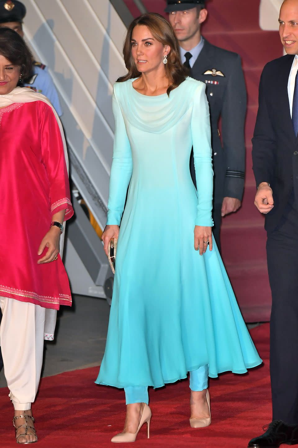 <p>Upon arrival in Pakistan, Kate wore a bespoke Catherine Walker look.</p>