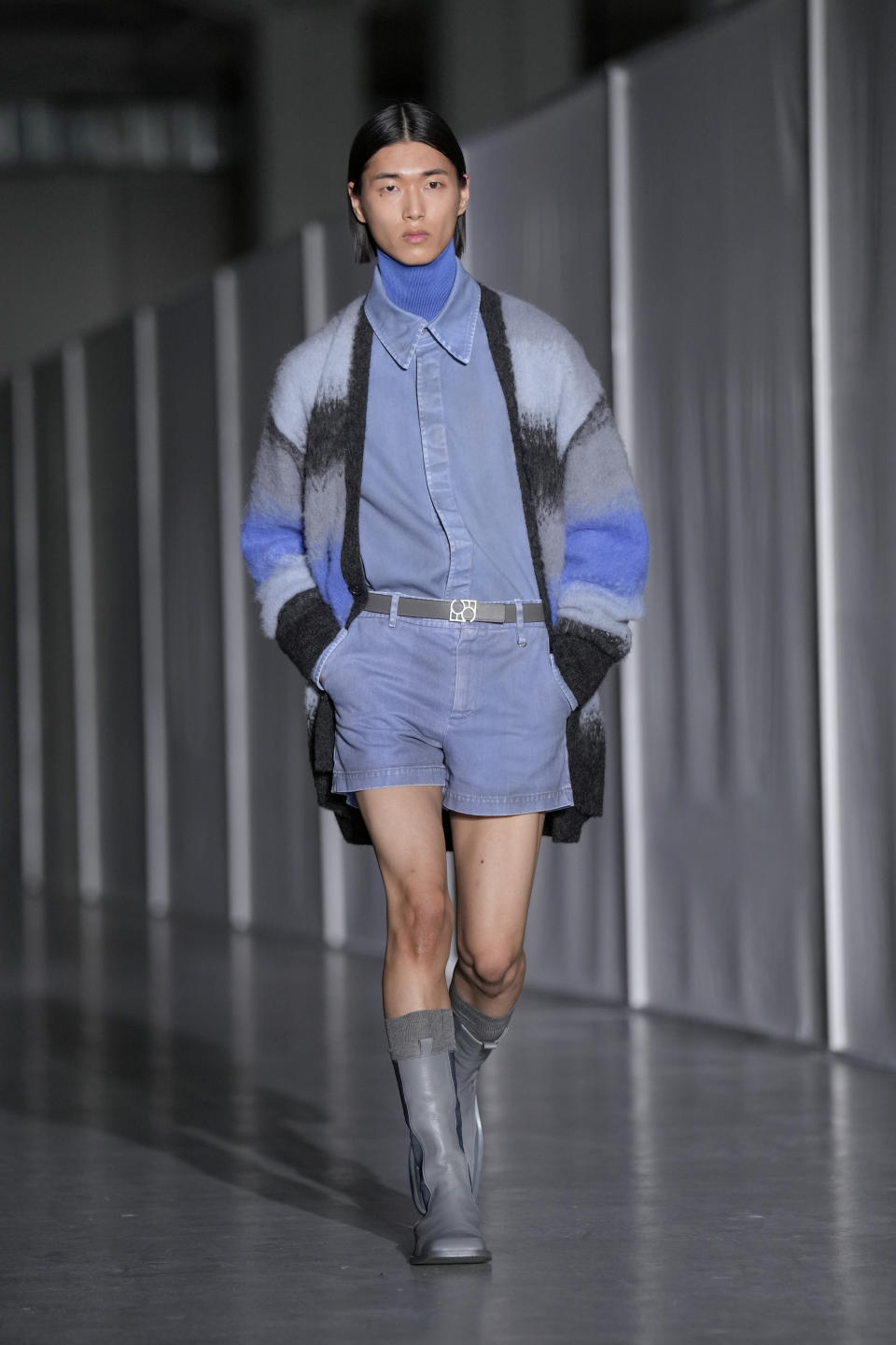 A model wears a creation as part of the men's Federico Cina Fall-Winter 2024-2025 collection, that was presented in Milan, Italy, Saturday, Jan. 13, 2024. (AP Photo/Antonio Calanni).