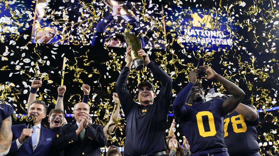 Harbaugh celebrates Michigan's College Football Playoff national championship over the Washington Huskies. - David J. Phillip/AP