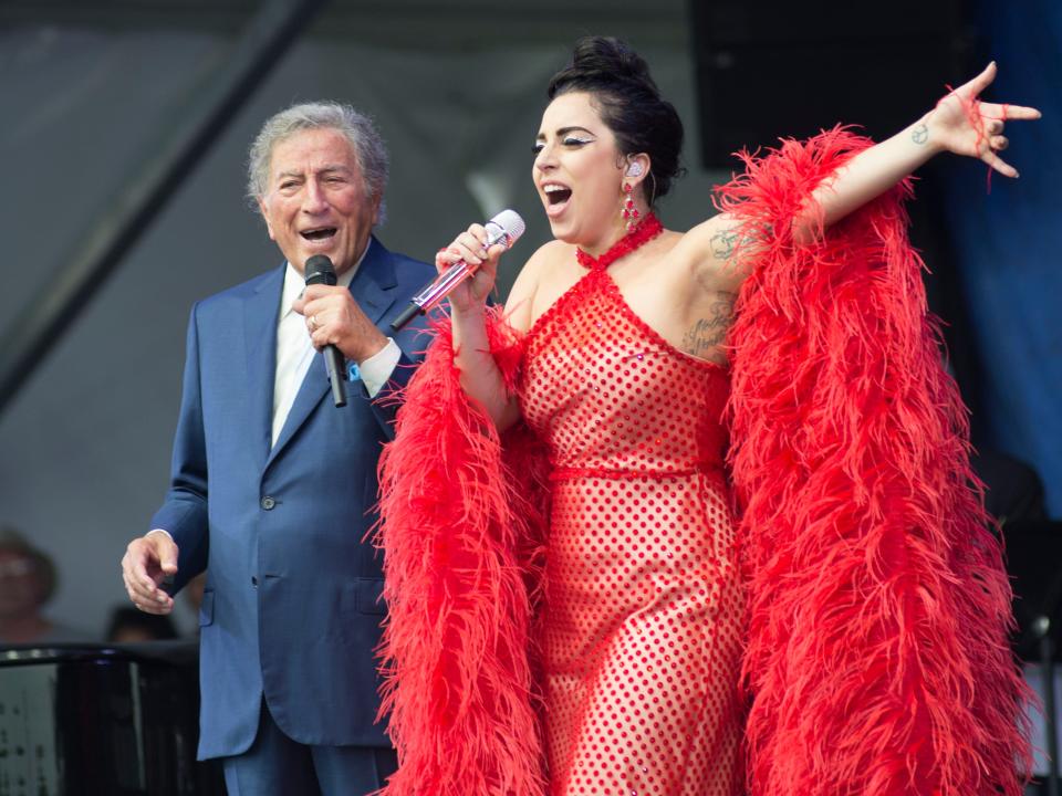 Tony Bennett and Lady Gaga perform during the 2015 New Orleans Jazz and Heritage Festival at the Fairgrounds Race Track in New Orleans, Louisiana on April 26, 2015