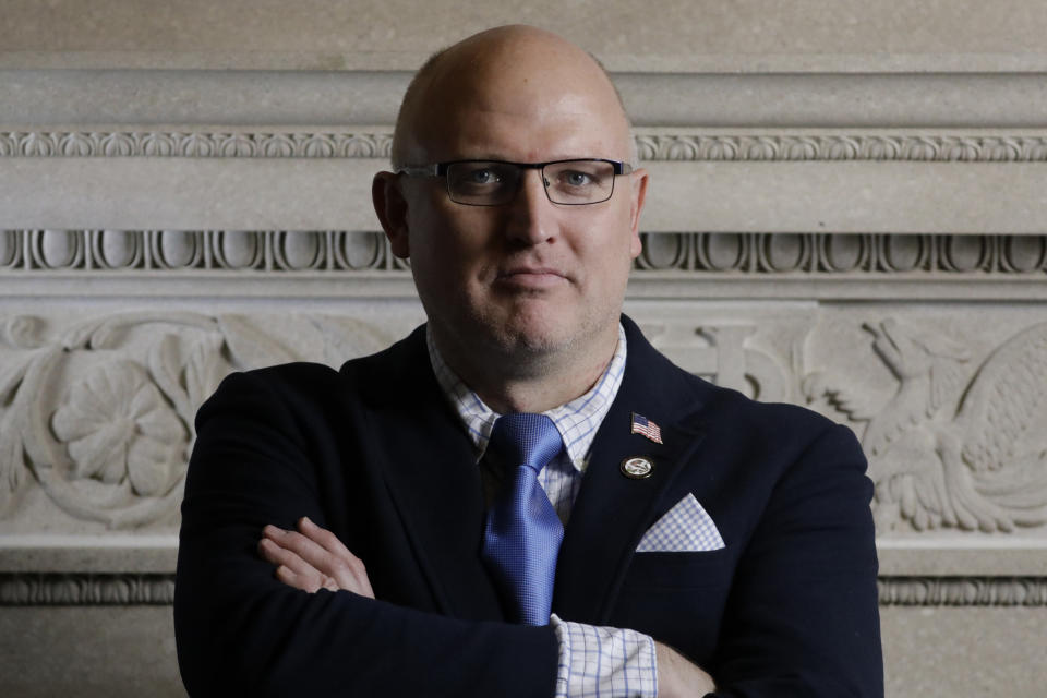 In this Jan. 30, 2020 photo, Republican Rep. Travis Seegmiller poses for a portrait at the Utah State Capitol. A proposal to require warning labels on pornography in Utah passed the state House on Tuesday Feb. 18, 2020, a move an adult-entertainment industry group called a dark day for freedom of expression. "I've had constituents, including some dear friends, bring to me their personal stories of the truly horrific and nightmarish costs their families have suffered because their child has been exposed to these sorts of things," said Seegmiller. (AP Photo/Rick Bowmer)