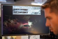 A monitor shows how the Ouster's lidar, used in scanning the area on a self-driving vehicle, sees the surrounding area, at the technology company's office in San Francisco