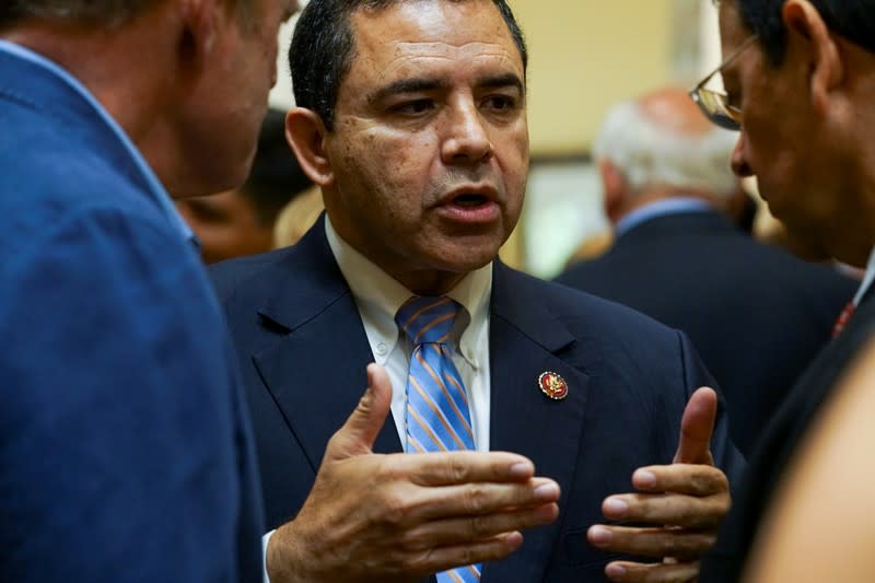 U.S. Rep. Henry Cuellar (D-TX) speaks with attendees during the Mr. South Texas award ceremony in Laredo, Texas