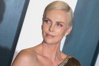 <p>Charlize's short and sleek style is proof that pixie cuts work perfectly with formalwear. </p>