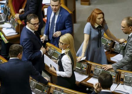 Ukrainian former Prime Minister and leader of Batkivshchyna (Fatherland) party Yulia Tymoshenko (C) attends a parliament session in Kiev, Ukraine, February 16, 2016. REUTERS/Gleb Garanich