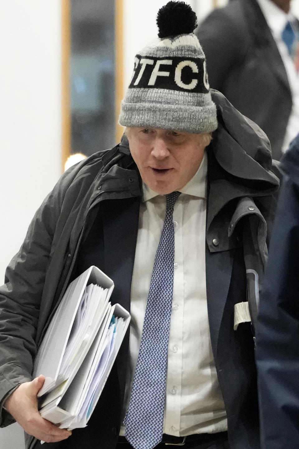 Britain's former Prime Minister Boris Johnson leaves after the COVID Inquiry at Dorland House in London, Thursday, Dec. 7, 2023. Johnson rejected suggestions that he wanted to let COVID-19 "rip" through the population as he defended his handling of the pandemic during a second day of testimony at a public inquiry into the crisis. (AP Photo/Kirsty Wigglesworth)