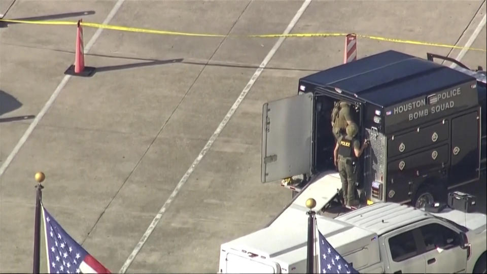 In this screen grab taken from video provided by KTRK-TV ABC13, members of the Houston Police Bomb Squad respond to a shooting at Lakewood Church, the Houston megachurch of celebrity pastor Joel Osteen, Sunday, Feb. 11, 2024. (KTRK-TV ABC13 via AP)