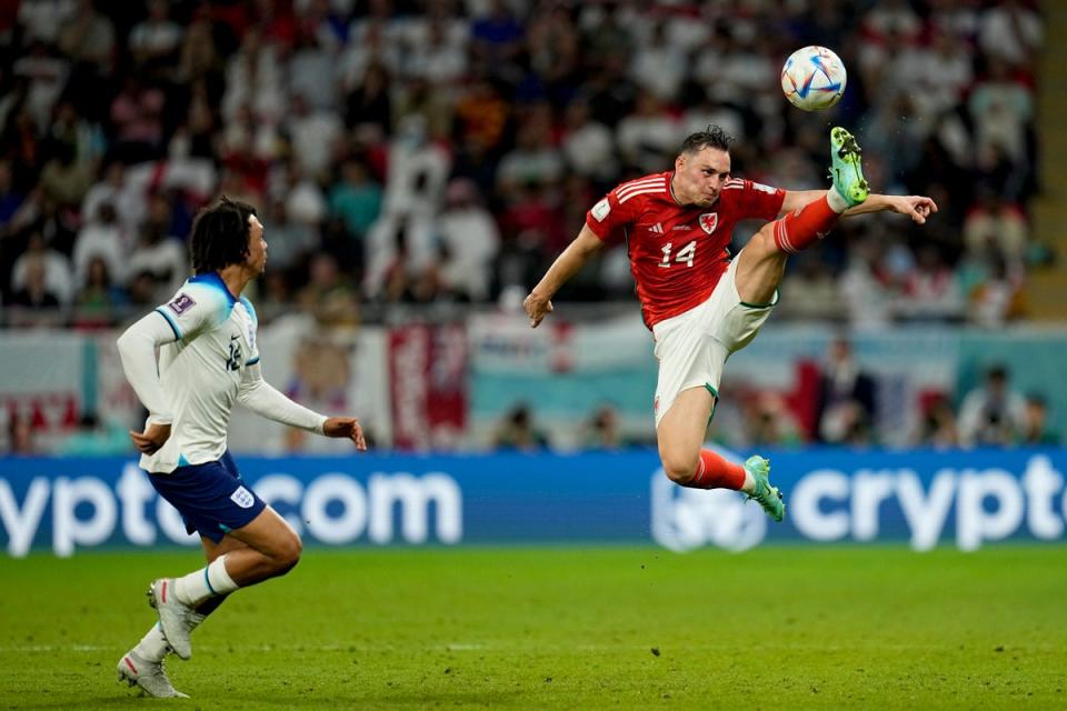 Connor Roberts rises to kick the ball (AP)