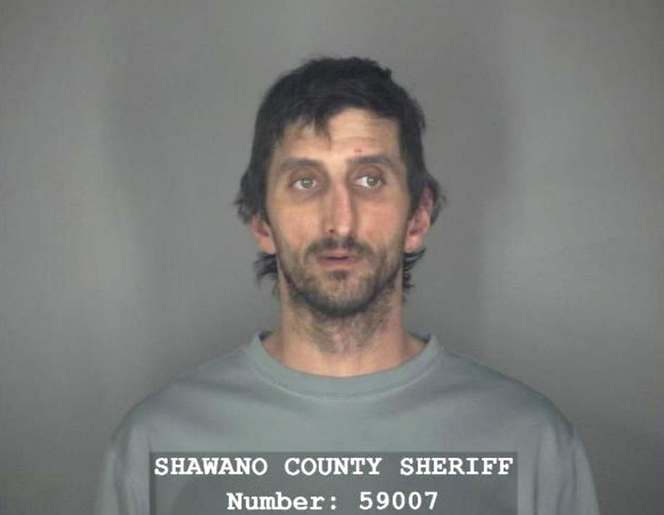 This Monday, Oct. 14, 2019 booking photo from the Shawano County Sheriff&#39;s Office shows Nathan Pogrant in Shawano, Wis. WLUK-TV reports that police arrested Pogrant Monday on charges including false imprisonment and child abuse after an 8-year-old boy told authorities that a man who lives with him and his mother strapped him to a chair in the basement of their northeastern Wisconsin home. The boy escaped and sought help from strangers.  (Shawano County Sheriff&#39;s Office, WLUK-TV via AP)