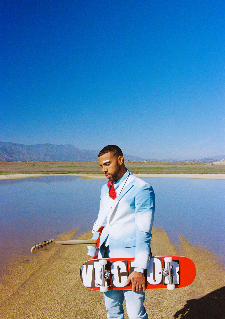 Vic Mensa wearing blue