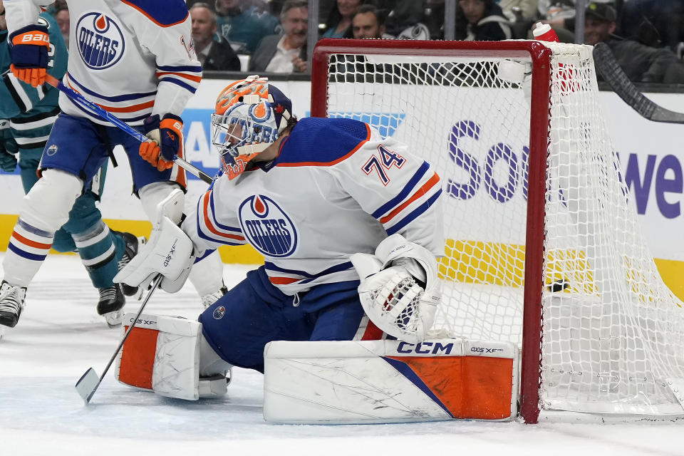 Edmonton Oilers goaltender Stuart Skinner (74) allows a goal by San Jose Sharks left wing Fabian Zetterlund during the first period of an NHL hockey game Thursday, Nov. 9, 2023, in San Jose, Calif. (AP Photo/Tony Avelar)