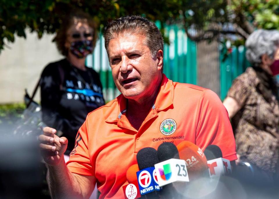 Mayor Carlos Hernandez speaks to the media as the city opens a new vaccination site at Bucky Dent Park in Hialeah, Florida, on Monday, March 15, 2021.