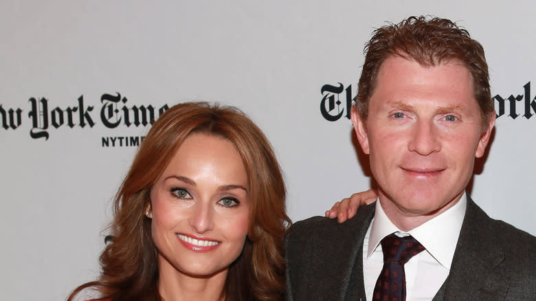 Giada de Laurentiis and Bobby Flay smiling together