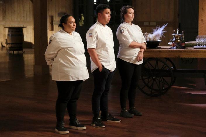 &quot;Top Chef&quot; 2022 finalists Evelyn Garcia, left, Buddha Lo and Sarah Welch wait for the judges' decision.
