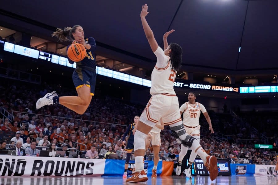 Drexel guard Laine McGurk (41) looks to score past Texas guard Gisella Maul (21) during the second half of a first-round college basketball game in the women’s NCAA Tournament in Austin, Texas, Friday, March 22, 2024. (AP Photo/Eric Gay)