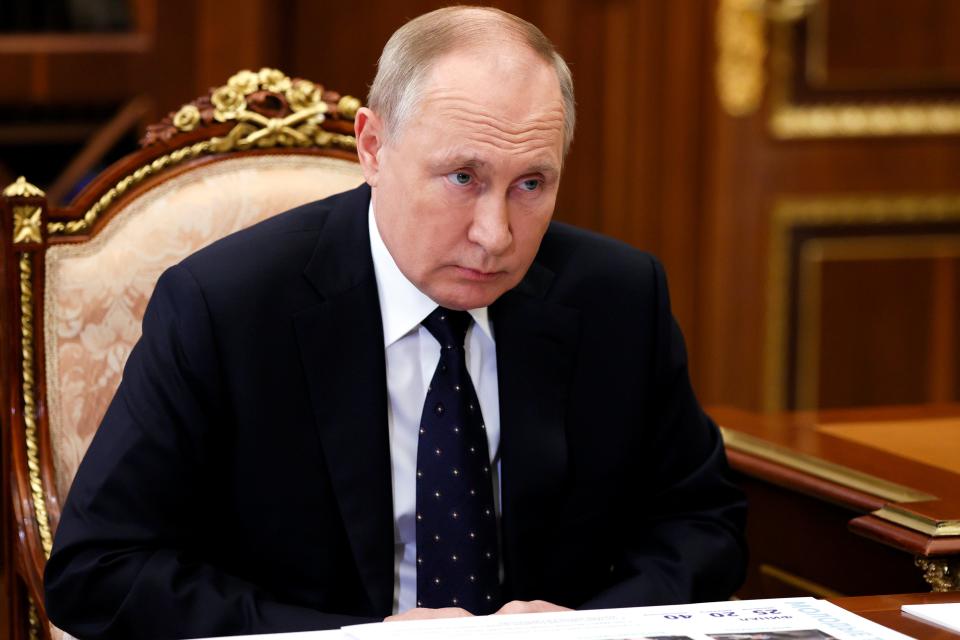 Russian President Vladimir Putin listens during a meeting in the Kremlin, in Moscow, Russia, Tuesday, Jan. 18, 2022.