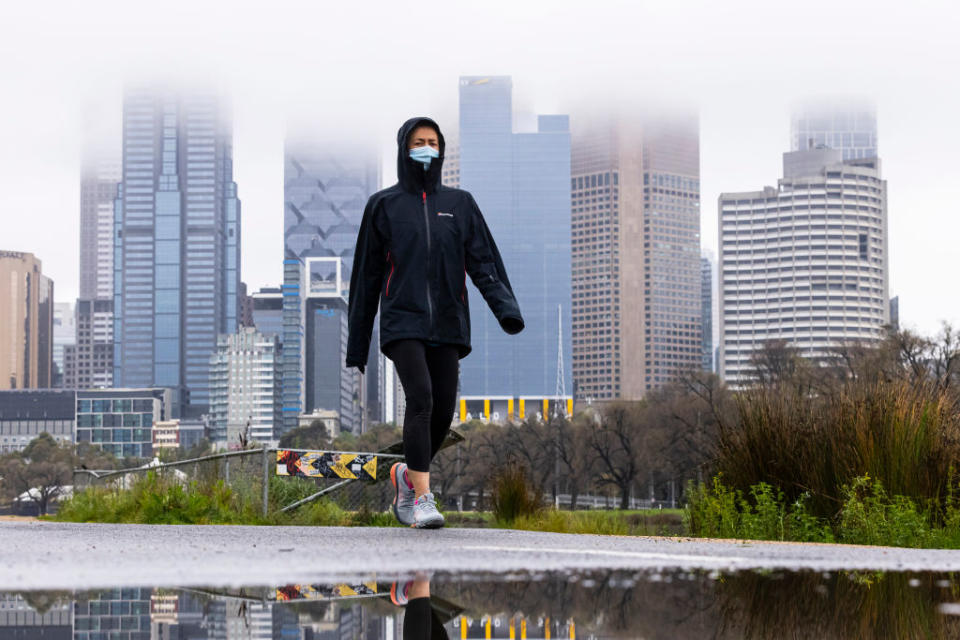 A lone person is seen exercising along the Yarra River in Melbourne, Australia. 