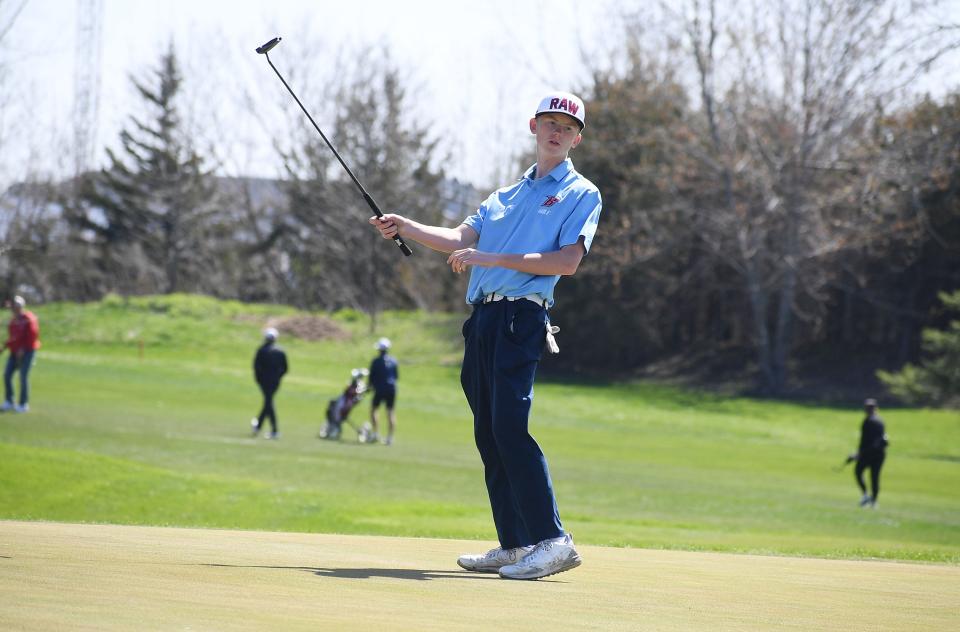 Ballard Bardy Kruger reacts after a putt onto the 10th hole in the Gilbert boys golf invitational at Ames Golf & Country Club Saturday, May 7, 2022, in Ames, Iowa.