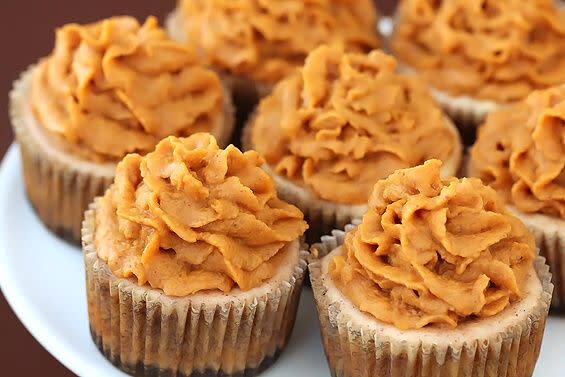<p>Calling all overachievers: These beauties bring together not just two, but three delicious desserts in one: cheesecake, pumpkin pie, and cupcakes. </p><p><strong>Get the recipe at <a href="https://www.gimmesomeoven.com/cinnamon-mini-cheesecakes-with-pumpkin-pie-frosting/" rel="nofollow noopener" target="_blank" data-ylk="slk:Gimme Some Oven;elm:context_link;itc:0;sec:content-canvas" class="link ">Gimme Some Oven</a>.</strong></p>