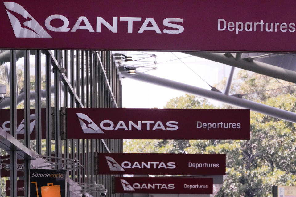 Qantas signage outside Sydney's domestic terminal, Wednesday, Sept. 13, 2023. Qantas Airways lost its challenge to a court ruling on Wednesday that the Australian flag carrier had illegally fired 1,700 baggage handlers, cleaners and other ground staff at the height of pandemic travel disruptions. (AP Photo/Mark Baker)