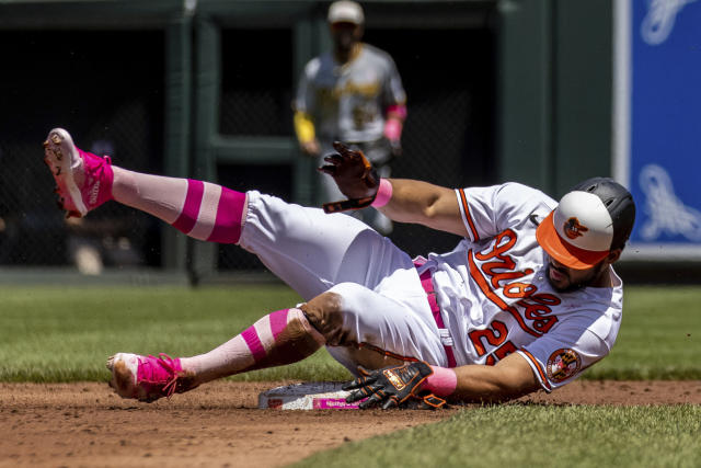 Baltimore Orioles' Anthony Santander (25) slides to second base during the first inning of a baseball game against the Pittsburgh Pirates, Sunday, May 14, 2023, in Baltimore. (AP Photo/Julia Nikhinson)