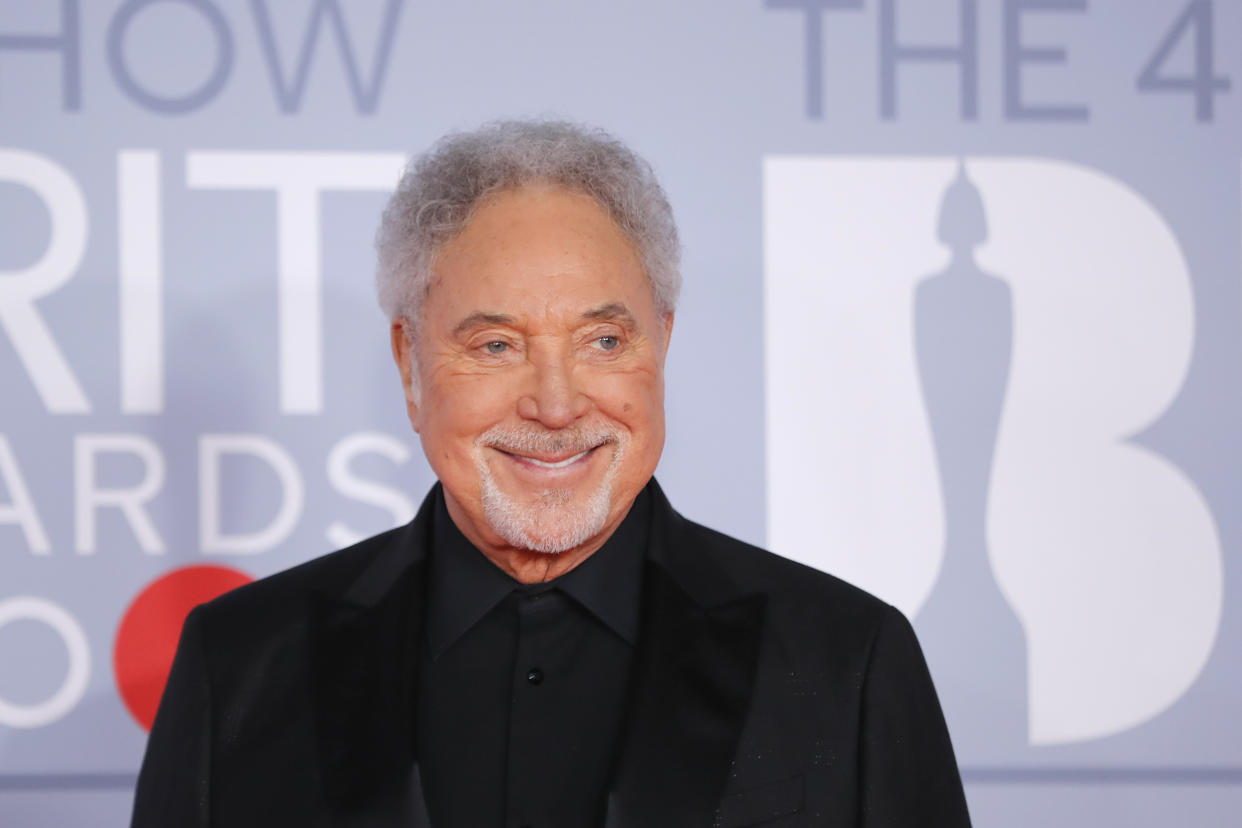 Sir Tom Jones has become the oldest male with a number one album in the UK charts. (Photo by TOLGA AKMEN/AFP via Getty Images)