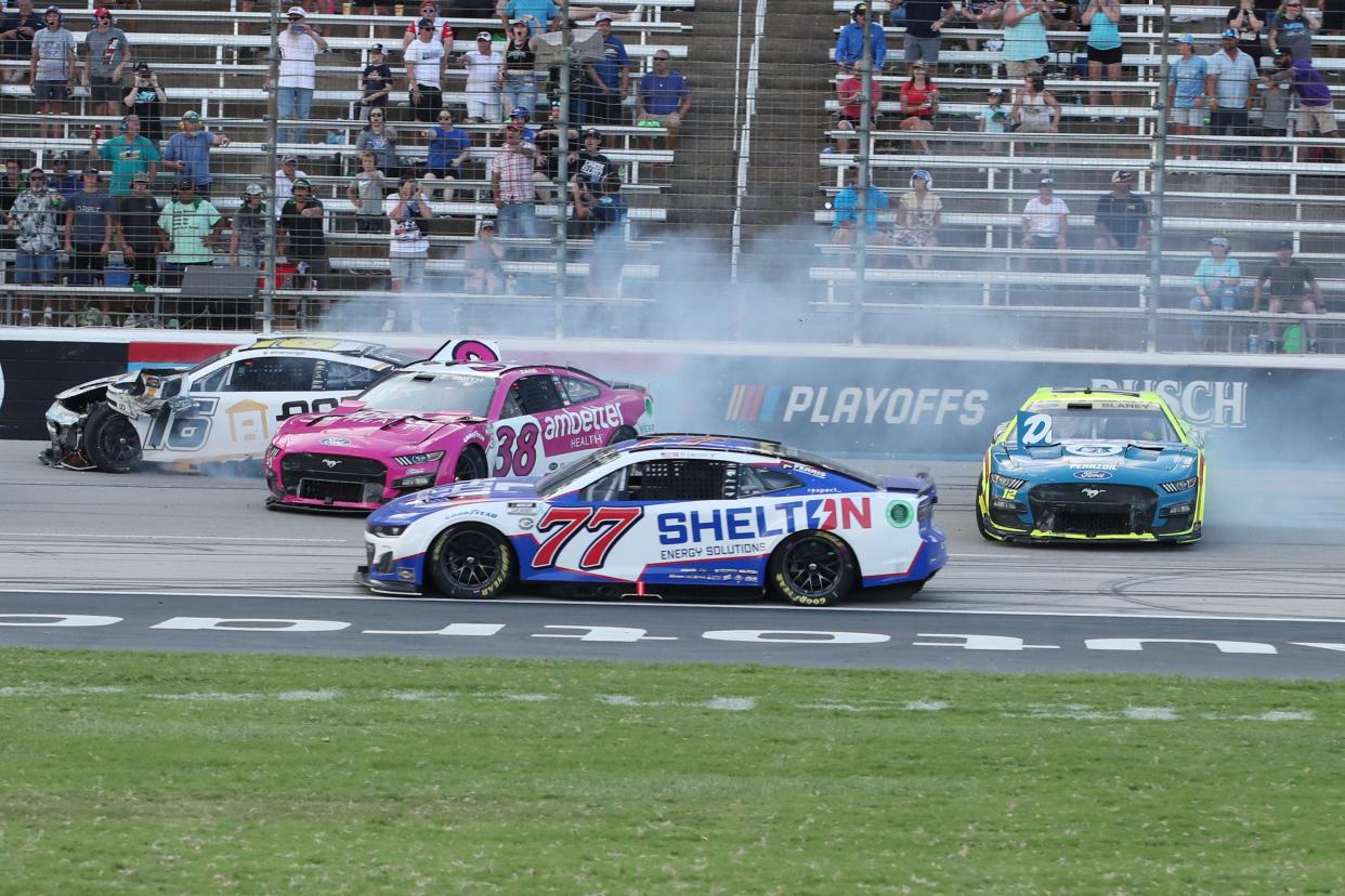Ryan Blaney (right) and AJ Allmendinger (16) are among those caught up in a crash late in Sunday's race at Texas.