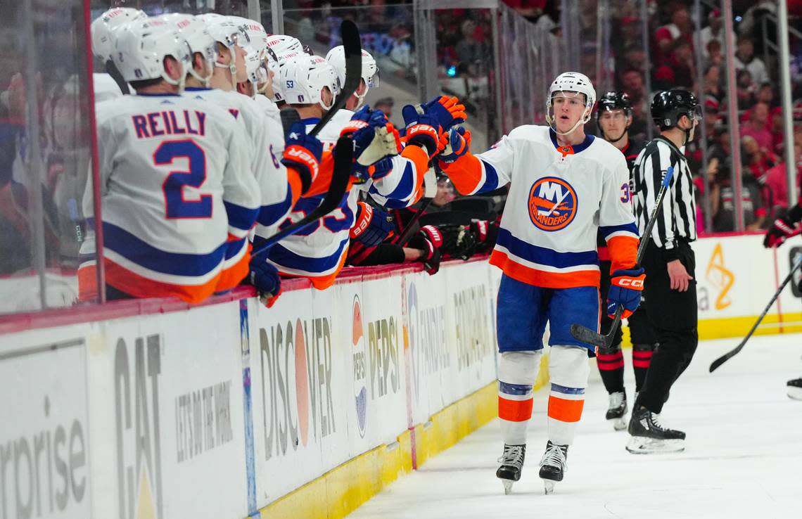 New York Islanders center Kyle MacLean (32) celebrates his goal against the Carolina Hurricanes during the first period in game one of the first round of the 2024 Stanley Cup Playoffs at PNC Arena.