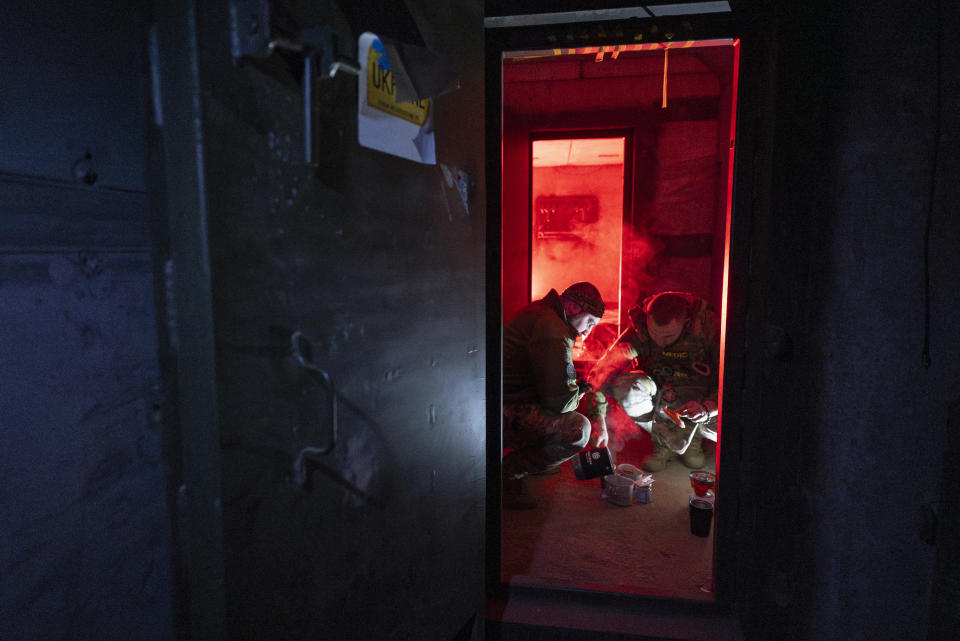 Ukrainian paramedics of 3rd Assault brigade prepare tea at a bomb shelter near Bakhmut, Donetsk region, Ukraine, Sunday, Sept. 10, 2023. When Ukrainian soldiers finally reclaimed Andriivka last week, it was at a high cost in lives. The village is significant largely because it's on the road to the Russian-held city of Bakhmut. (AP Photo/Mstyslav Chernov)