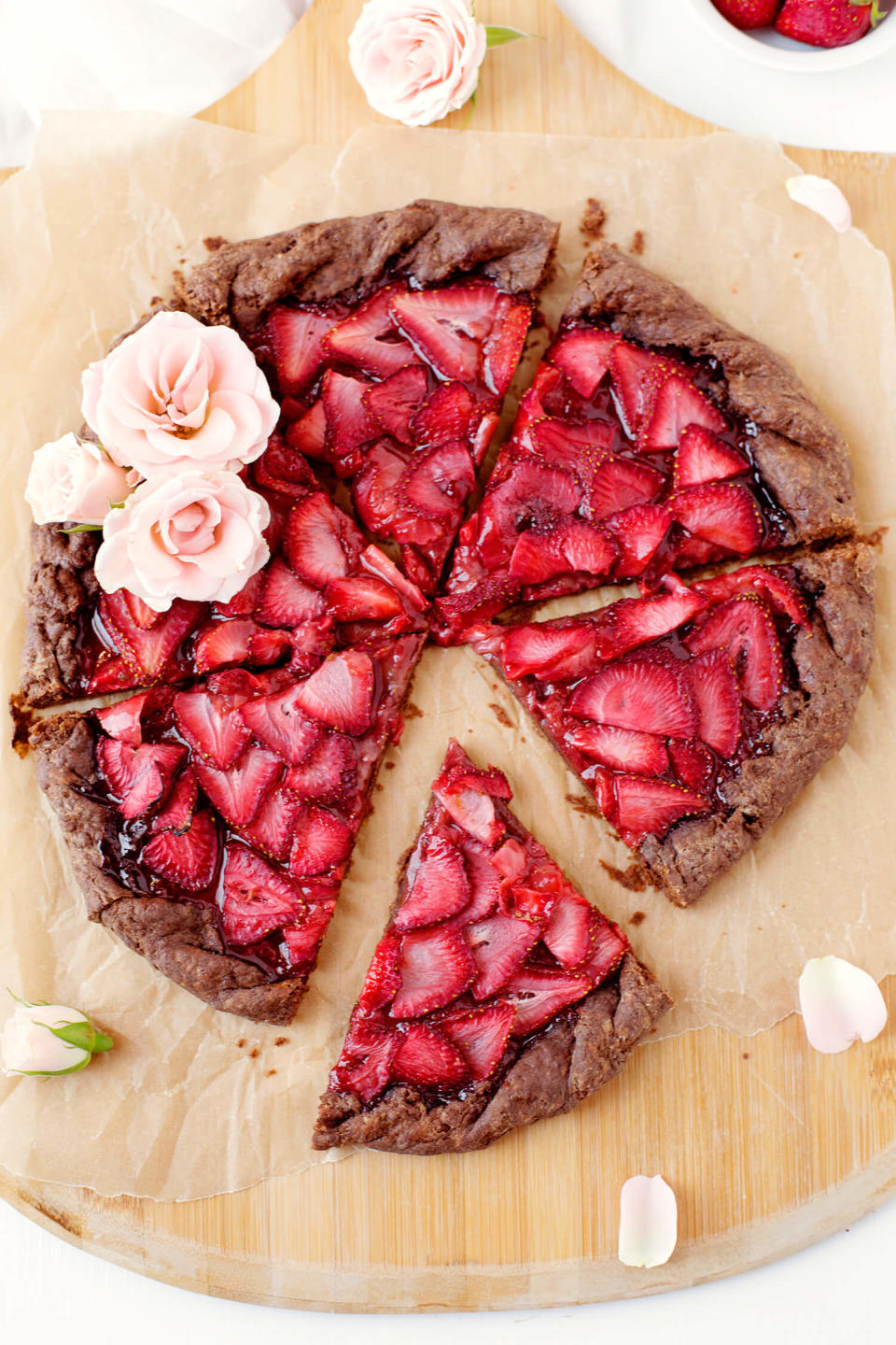 <strong>Get the <a href="http://www.abeautifulmess.com/2016/07/strawberries-and-champagne-galette-with-a-chocolate-crust.html" target="_blank">Strawberries And Champagne Galette With A Chocolate Crust recipe</a> from A Beautiful Mess</strong>