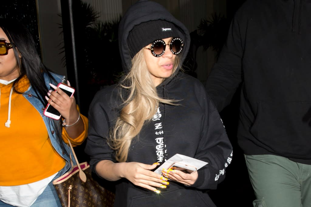 Cardi B Does the Monochrome Trend With T-Shirt, Sweats, Chunky