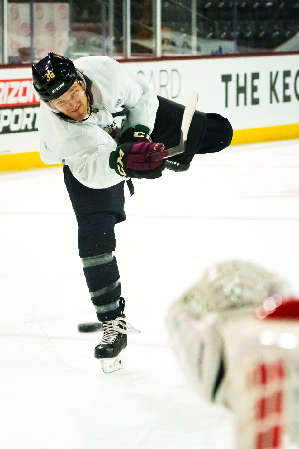 Christian Fischer (36) takes a shot during the Coyotes' practice at Mullett Arena on Oct. 27, 2022.