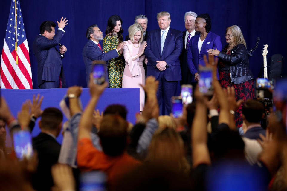 Guillermo Maldonado (left) and other evangelical leaders pray for President Donald Trump at an evangelical rally in Miami on Jan. 3, 2020. (Photo: Eva Marie Uzcategui / Reuters)