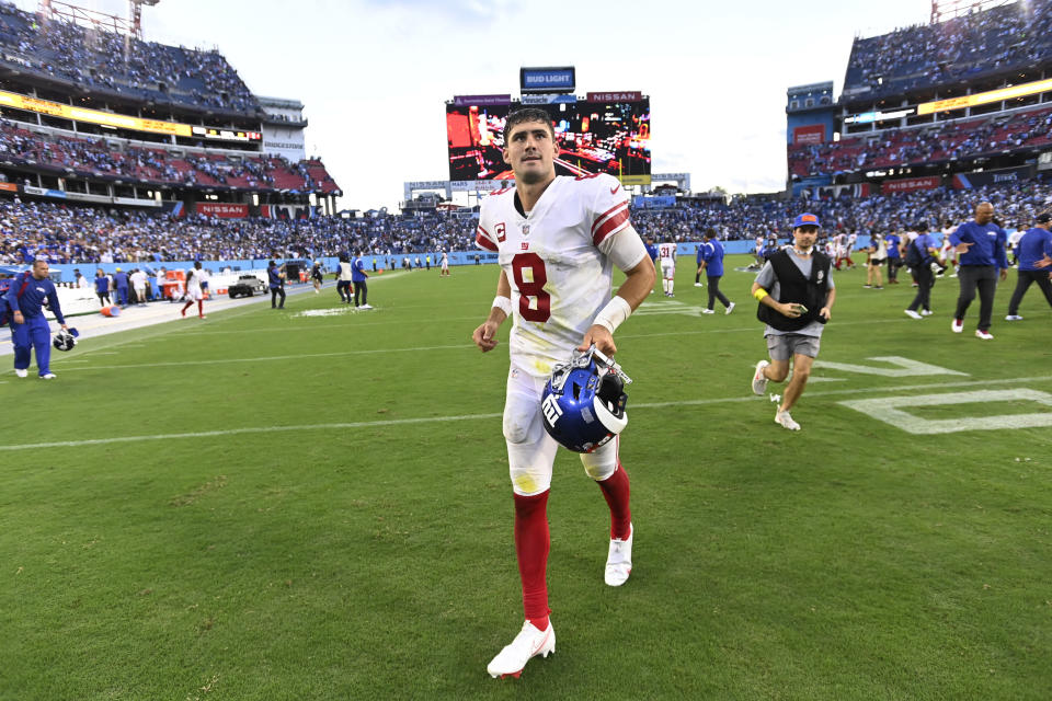 New York Giants quarterback Daniel Jones (8) runs off the field after the Giants defeated the Tennessee Titans 21-20 in an NFL football game Sunday, Sept. 11, 2022, in Nashville. (AP Photo/Mark Zaleski)