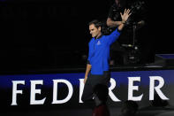 Team Europe's Roger Federer of Switzerland, waves during the opening ceremony of the Laver Cup tennis tournament at the O2 in London, Friday, Sept. 23, 2022. (AP Photo/Kin Cheung)