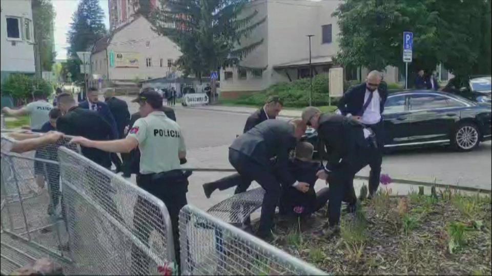 PHOTO: This image taken from video footage obtained by AFPTV shows security personnel carrying Slovakia's Prime Minister Robert Fico (C) toward a vehicle after he was shot in Handlova on May 15, 2024. (RTVS/AFP via Getty Images)