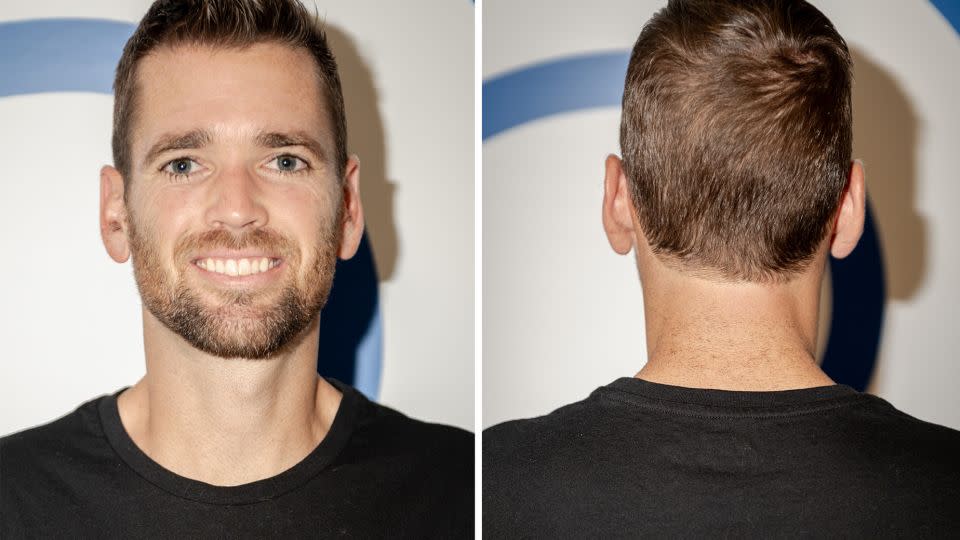 Tennis player Austin Krajicek shows off a fresh haircut at Julien Farel's salon inside of Arthur Ashe stadium in New York on August 30. - Will Lanzoni/CNN