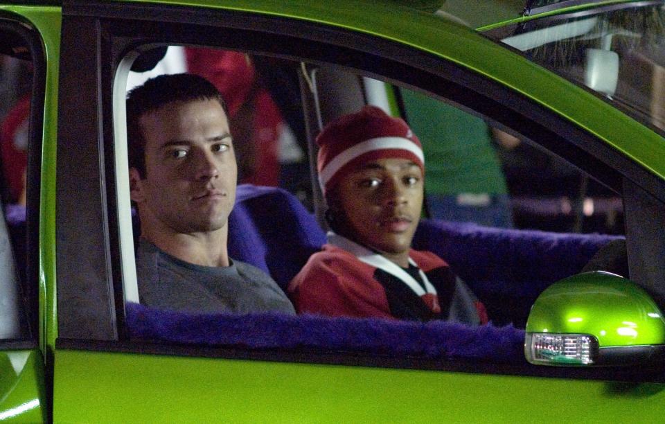 Two men look out of a car in "The Fast and the Furious: Tokyo Drift"