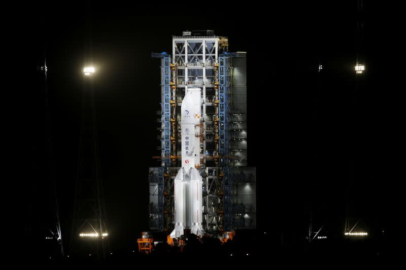 The Long March-5 Y5 rocket, carrying the Chang'e-5 lunar probe, is seen before taking off from Wenchang Space Launch Center, in Wenchang