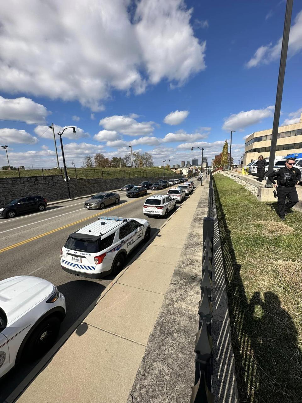 Dozens of officers and state troopers from across several cities in Montgomery and Greene counties gathered outside Miami Valley Hospital Tuesday as Officer Cody Cecil was released from Miami Valley Hospital five days after he was shot while serving a warrant in Clayton.