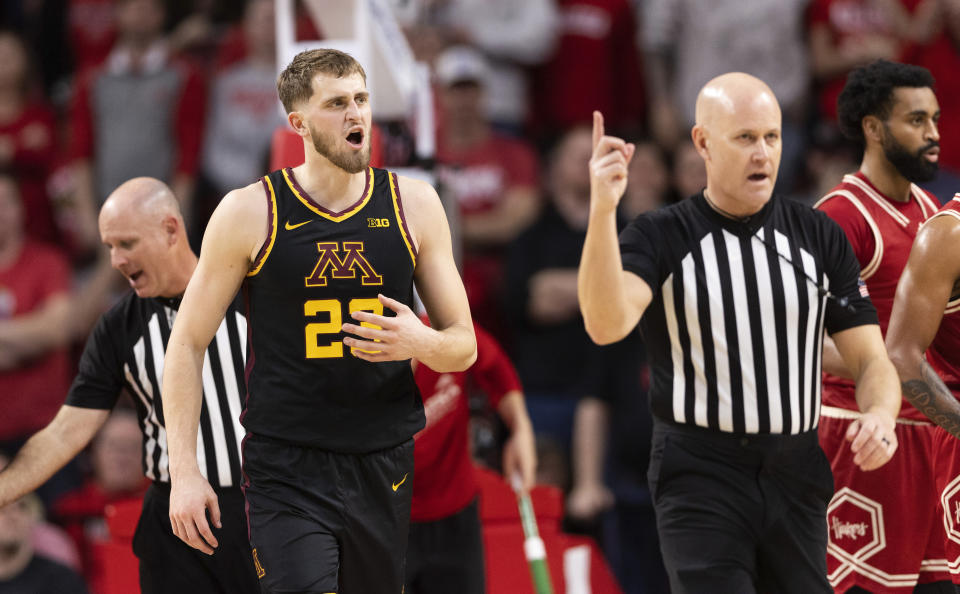 Minnesota's Parker Fox (23) argues with a referee after a flagrant foul was called on a teammate while playing against Nebraska during the second half of an NCAA college basketball game Sunday, Feb. 25, 2024, in Lincoln, Neb. (AP Photo/Rebecca S. Gratz)