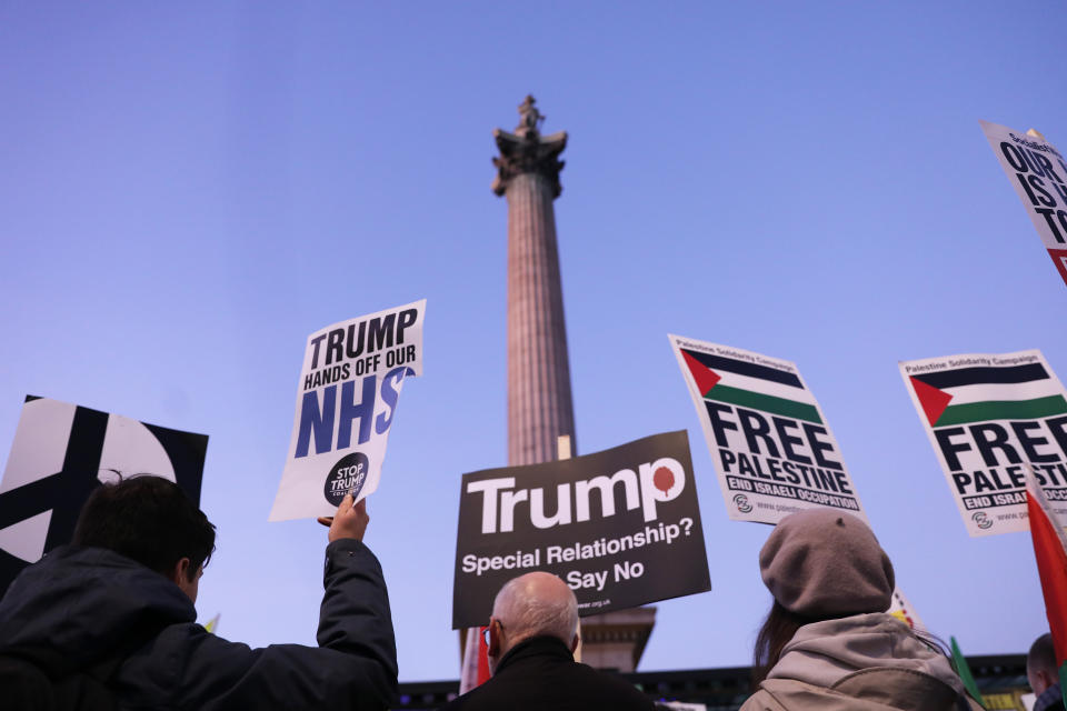 People gather in Trafalgar Square, London, for a "Hands off our NHS" protest against Donald Trump, who is in the capital as Nato leaders gather to mark 70 years of the alliance.